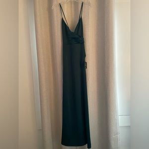 Dark Green Lulus Gown. Adjustable straps, slit on the front left.